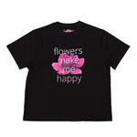 Black t-shirt with pink lotus flower and text 'flowers make me happy' on a white background