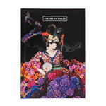 Notebook cover with a colorful floral mannequin and 'Fleurs de Villes' branding.